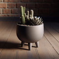 Pot de fleurs de design du milieu du siècle avec pieds