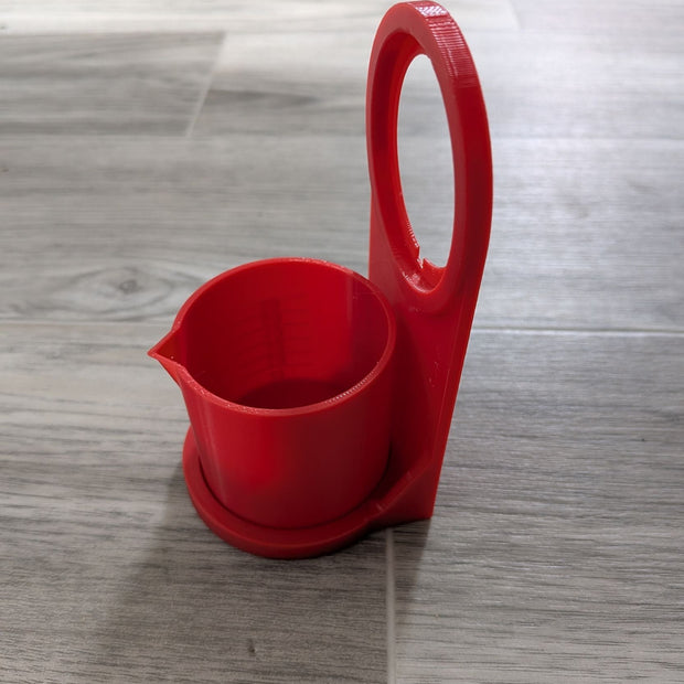 Tasse et porte gobelet pour détergent