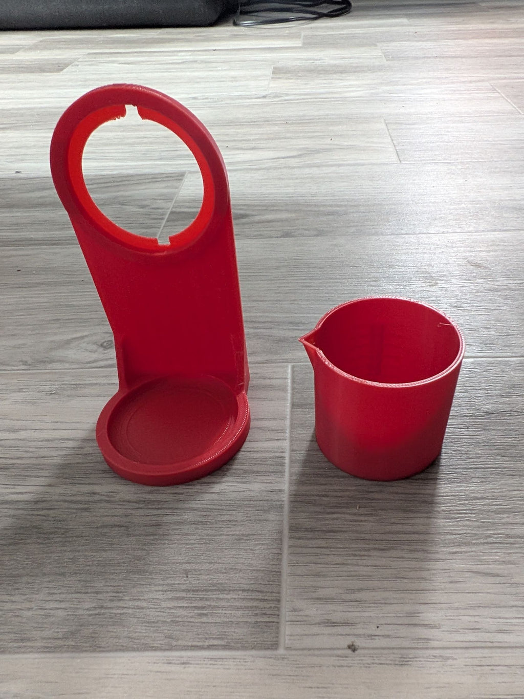 Tasse et porte gobelet pour détergent
